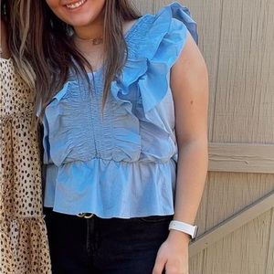 Strut & Bolt ruffle light blue top!